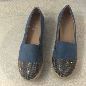 Woman’s suede slip-on shoes